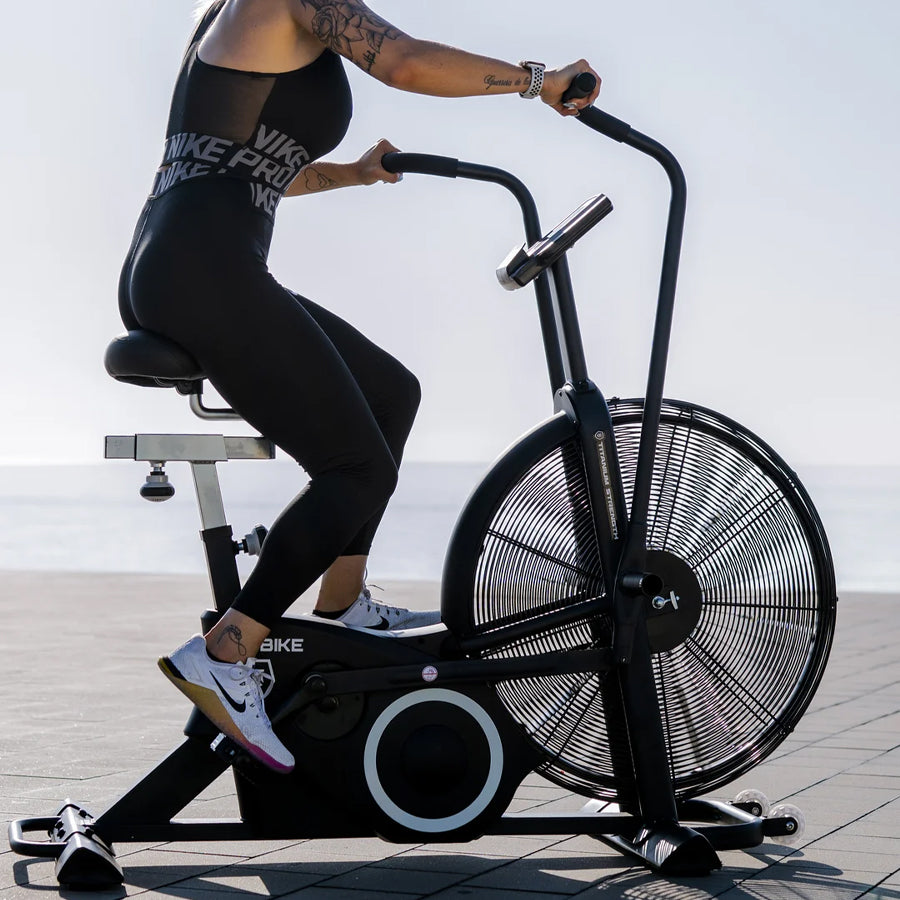 CURSOR FITNESS Premium Exercise Bike - Stationary Spin Cycle with Quiet Belt Drive System - Adjustable Resistance Levels - Extra Comfort Seat - LCD Display - Home Cardio Indoor Cycling Workout