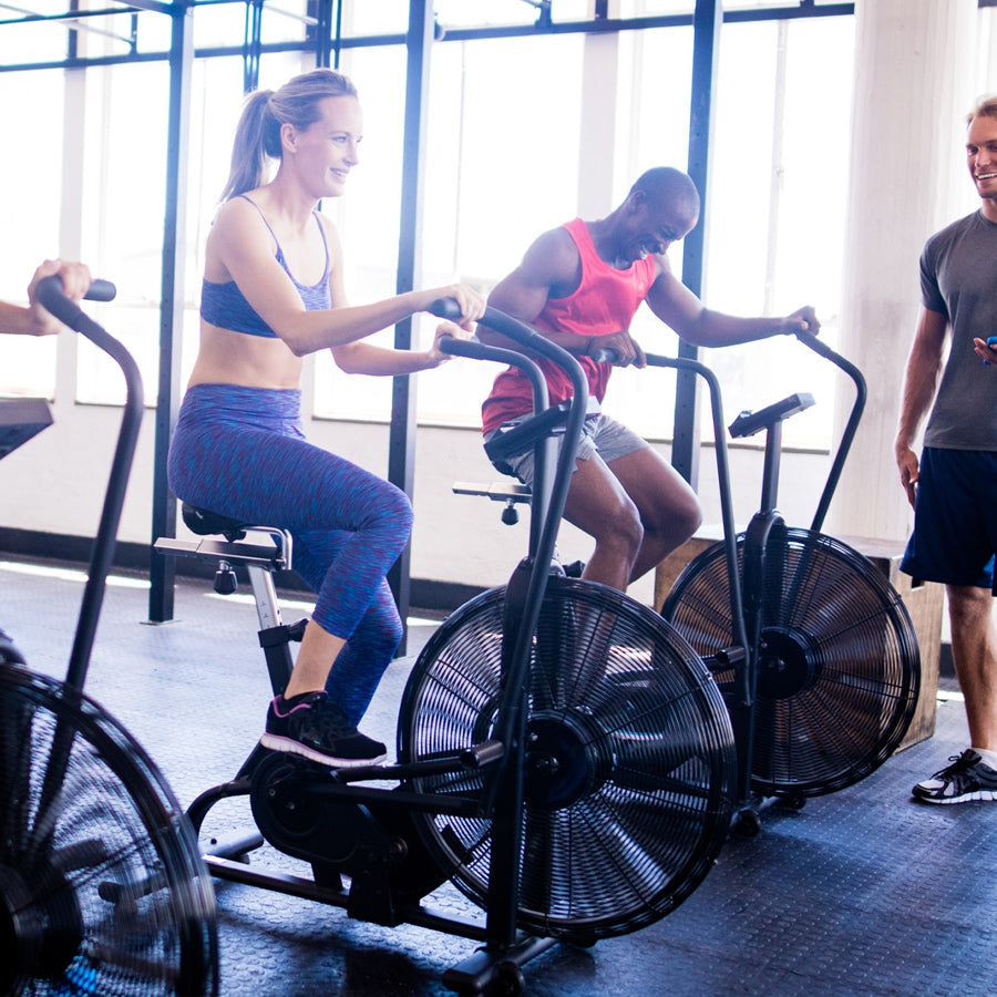 CURSOR FITNESS Premium Exercise Bike - Stationary Spin Cycle with Quiet Belt Drive System - Adjustable Resistance Levels - Extra Comfort Seat - LCD Display - Home Cardio Indoor Cycling Workout