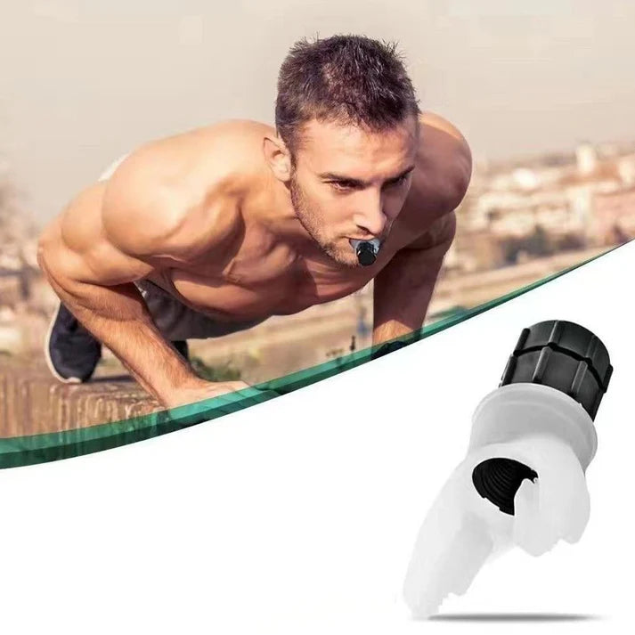 Man in push-up position with a white and black fitness device on a clear surface.