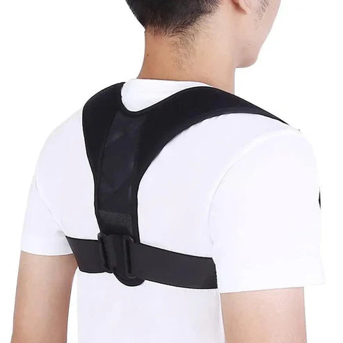 Person wearing a black posture corrector on a white background