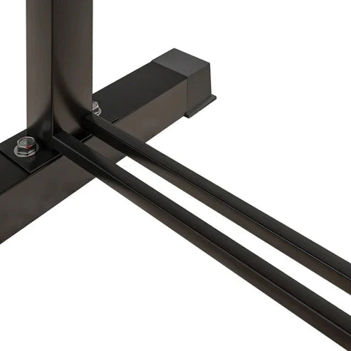 Close-up of a black metal bracket on a white background