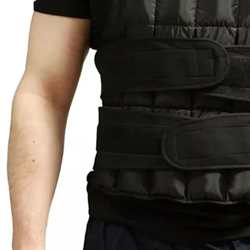 Black weighted vest on a person against a white background