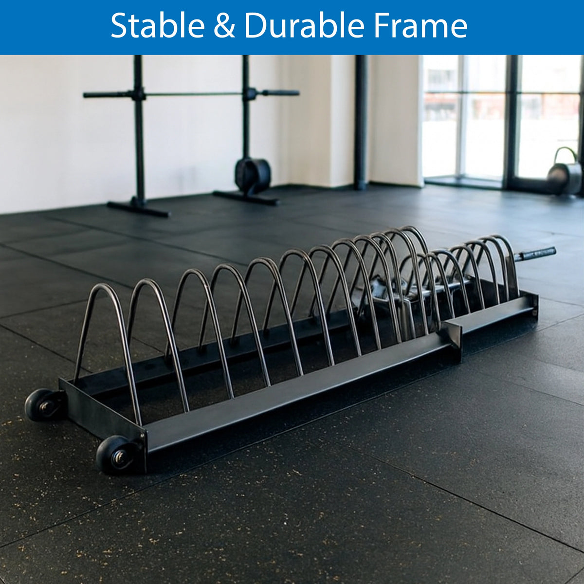Black metal bike rack on a gym floor with 'Stable & Durable Frame' text above.