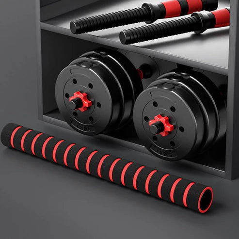 Dumbbells with red accents on a gray surface