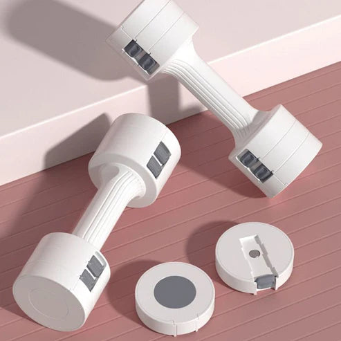 White dumbbells with digital displays on a pink surface