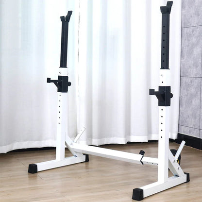 White weight lifting bench with black accents on a wooden floor against a white curtain background