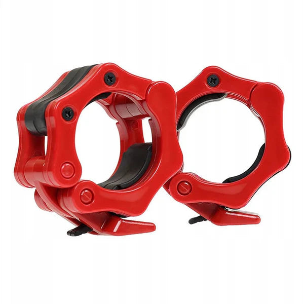 Red metal clamps on a white background