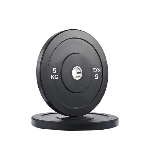 Black weight plate with '5 KG' marking on a white background