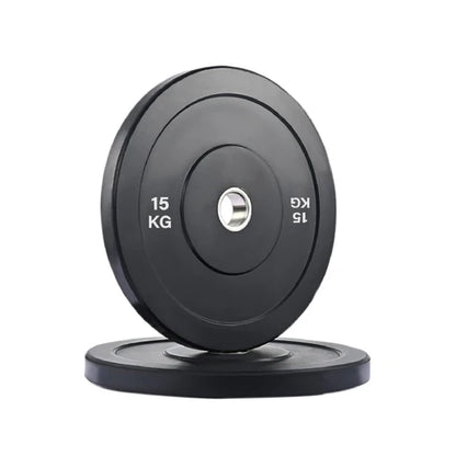Black weight plate with '15 KG' marking on a white background