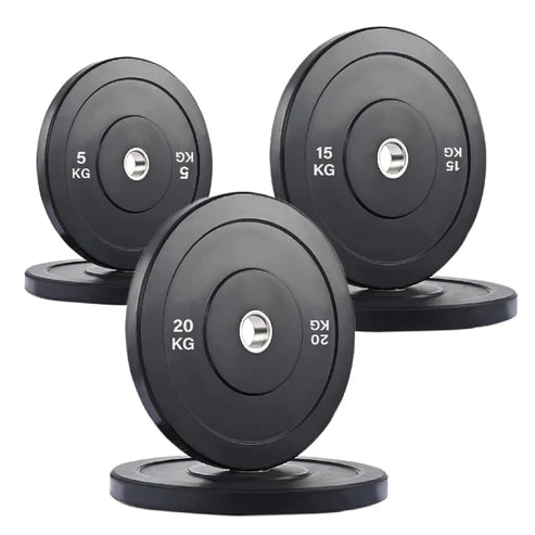 Set of black weight plates with weight markings on a white background