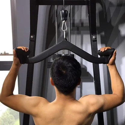 Person using a cable machine in a gym setting