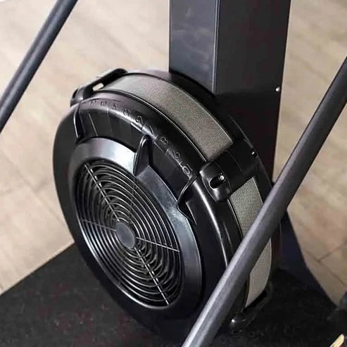 Close-up of a black office chair with a visible brand logo on the backrest.
