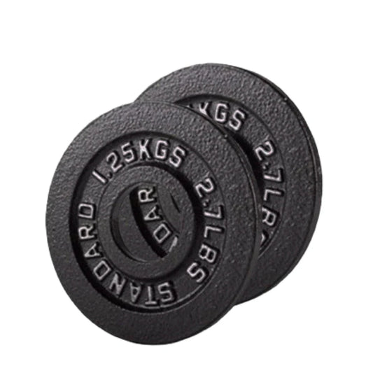 Two black weight plates with measurement markings on a white background