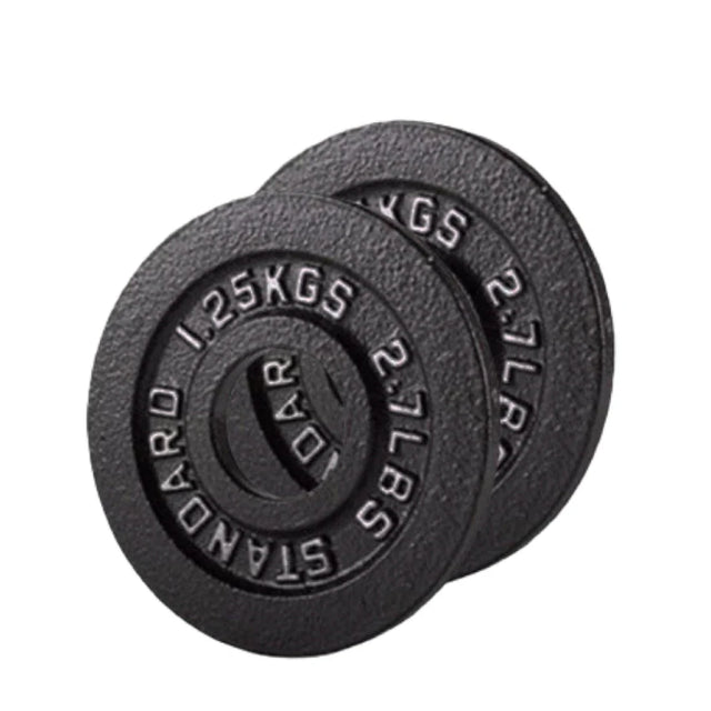 Two black weight plates with measurement markings on a white background