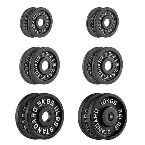 Set of six black wheels with metal rims on a white background