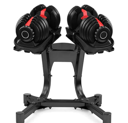 Pair of adjustable dumbbells on a stand with a white background