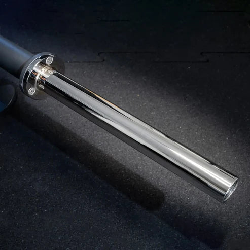 Metal rod with a silver end on a dark surface