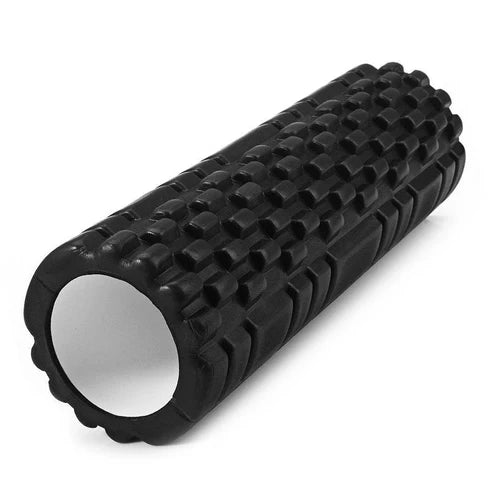 Black foam roller with textured surface on a white background