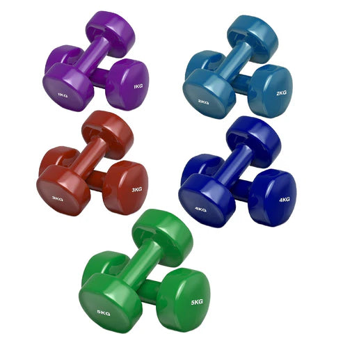 Set of colorful dumbbells with weights on a white background