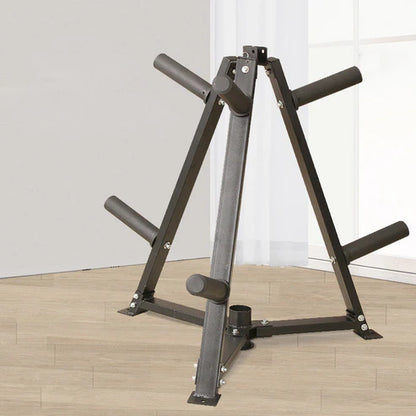 Black weight lifting stand on a wooden floor with a white wall background