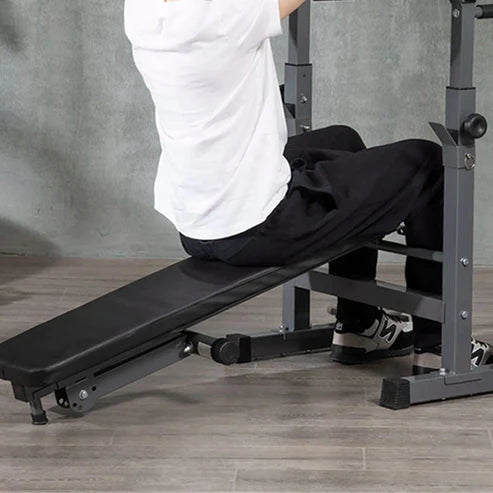 Weight bench with adjustable barbell stand on a white background