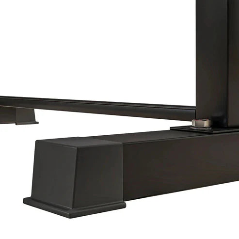 Close-up of a black metal bracket on a white background
