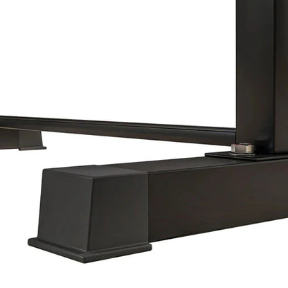 Close-up of a black metal bracket on a white background